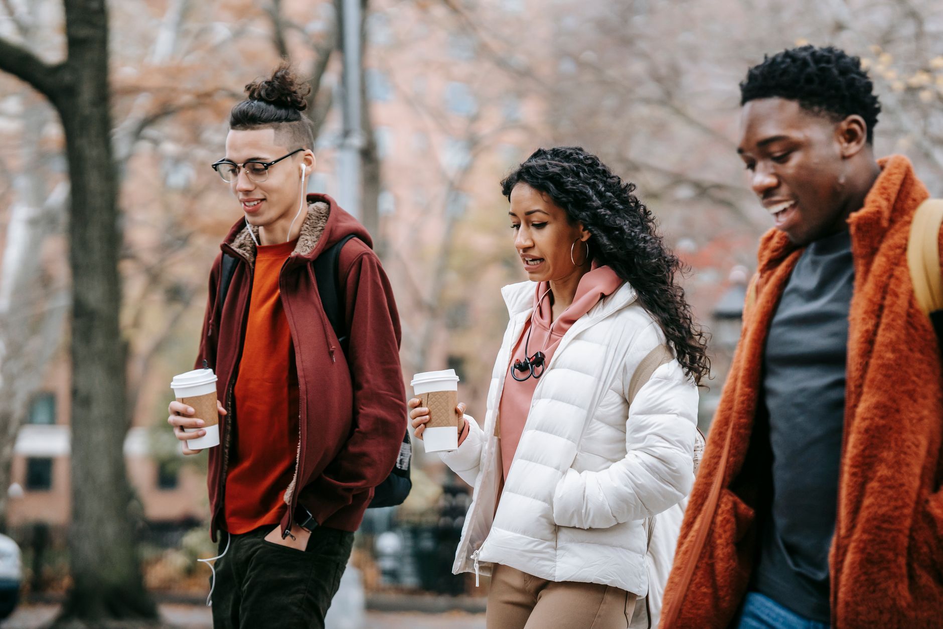A group of young people walking outdoors — hay fever is so common that most groups include someone affected